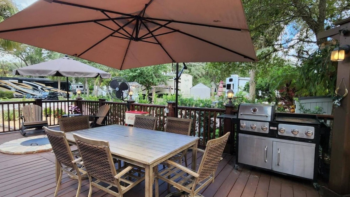River Ranch RV Rental | Large Corner RV Lot at River Ranch RV Resort! Full Hookup w/Enclosed Deck! 186