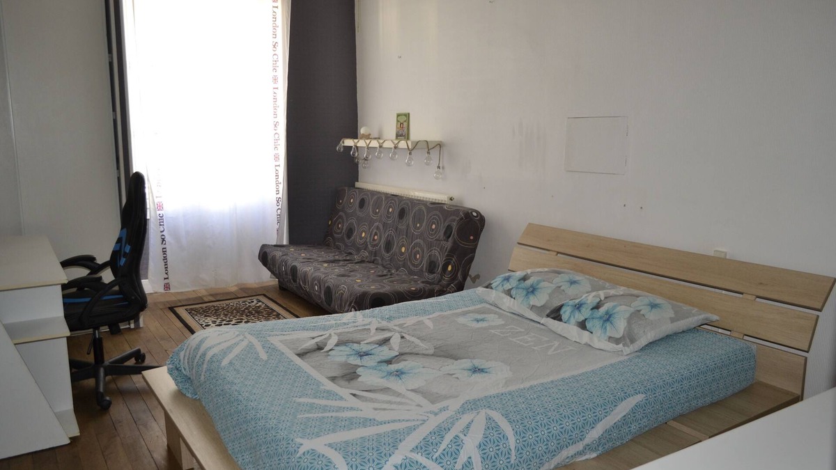 Chef-Boutonne Bed & Breakfast | Large guest room with bed and sofa bed