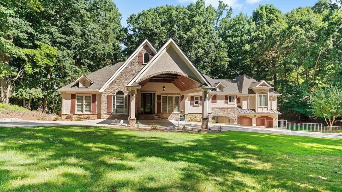 Flowery Branch House | Large Luxury Lake Home with Private Dock, Pet Friendly, Hot Tub