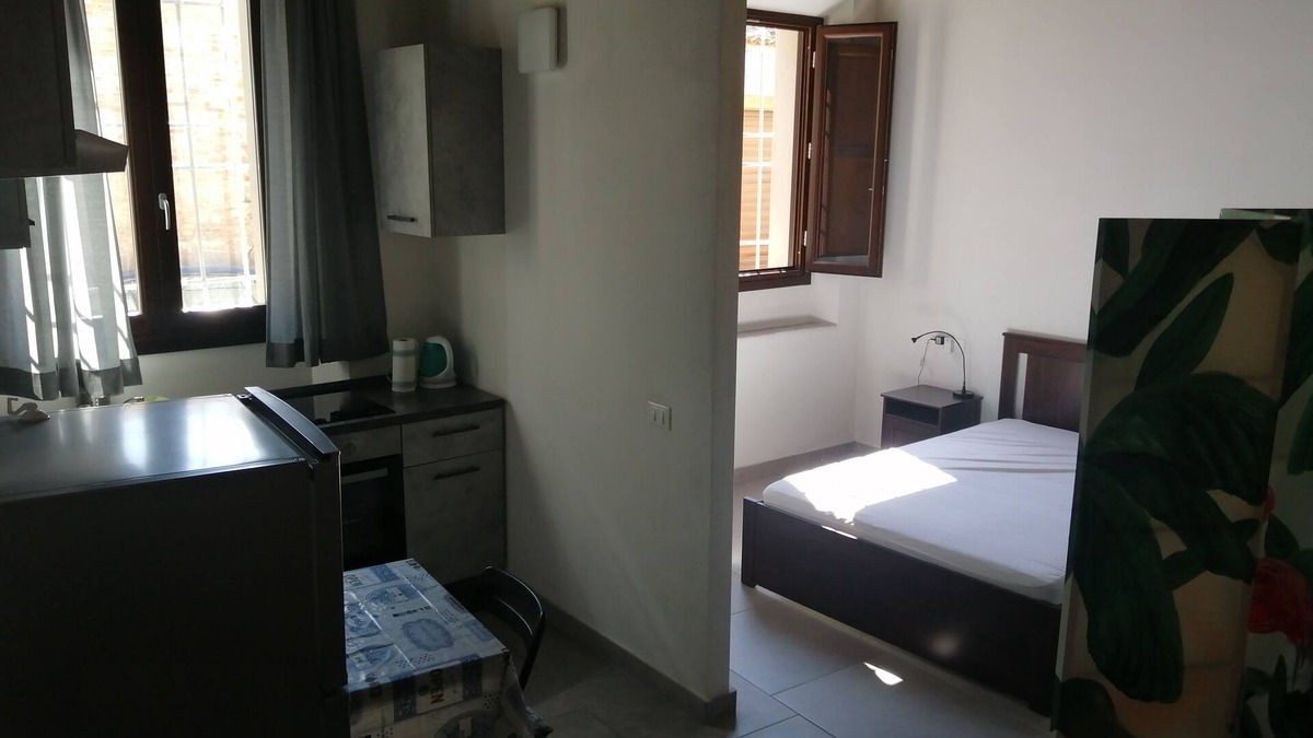 Faenza Apartment | Large studio apartment with separate rooms
