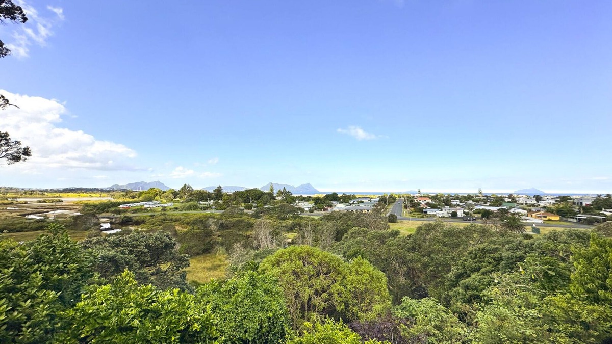 Ruakaka House | Large sunny home with stunning panoramic sea views of Bream Bay