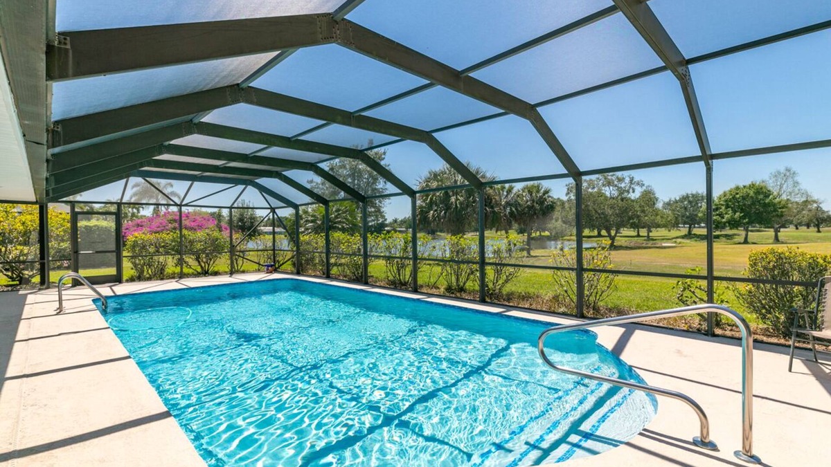 Port Saint Lucie House | Large Tropical Pool Lakefront Golf course 4-bedroom Home Close to Jensen Beach!