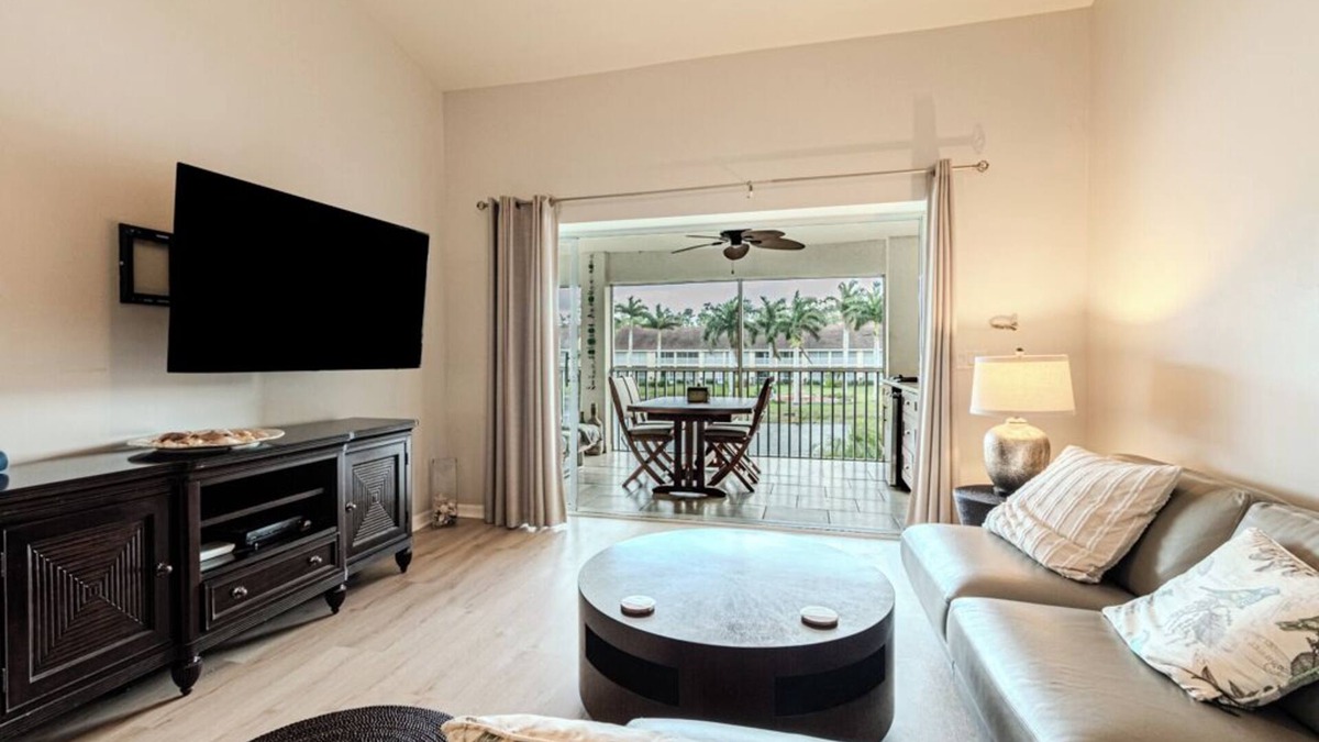 Naples Condo | Large updated lanai overlooking the heart of the water at Magnolia Falls.