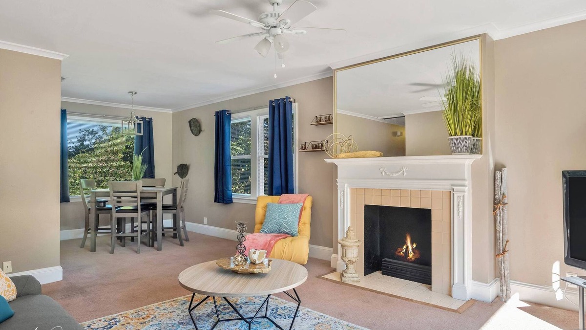 Caddo Heights-South Highlands Apartment | Large windows overlooking streets of historic South Highlands makes this cozy!