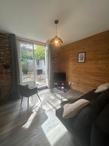 Grisolles Apartment | Le cosy Balat Biel RDC jardin spacieux