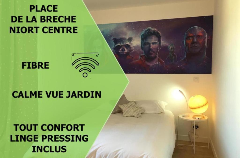 Centre Ville Apartment | Le Galaxy centre la Brèche wifi calme vue jardin