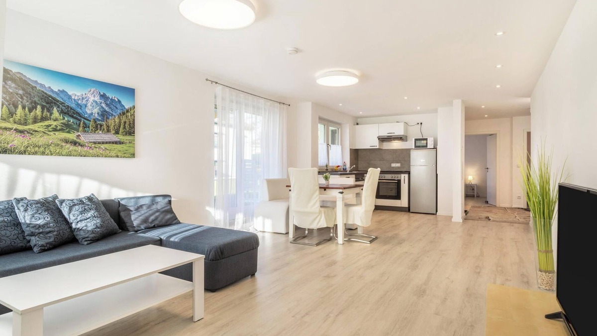 Enzisweiler Apartment | Light-flooded and Modern Apartment “Gartenstraße” with Terraces and Garden