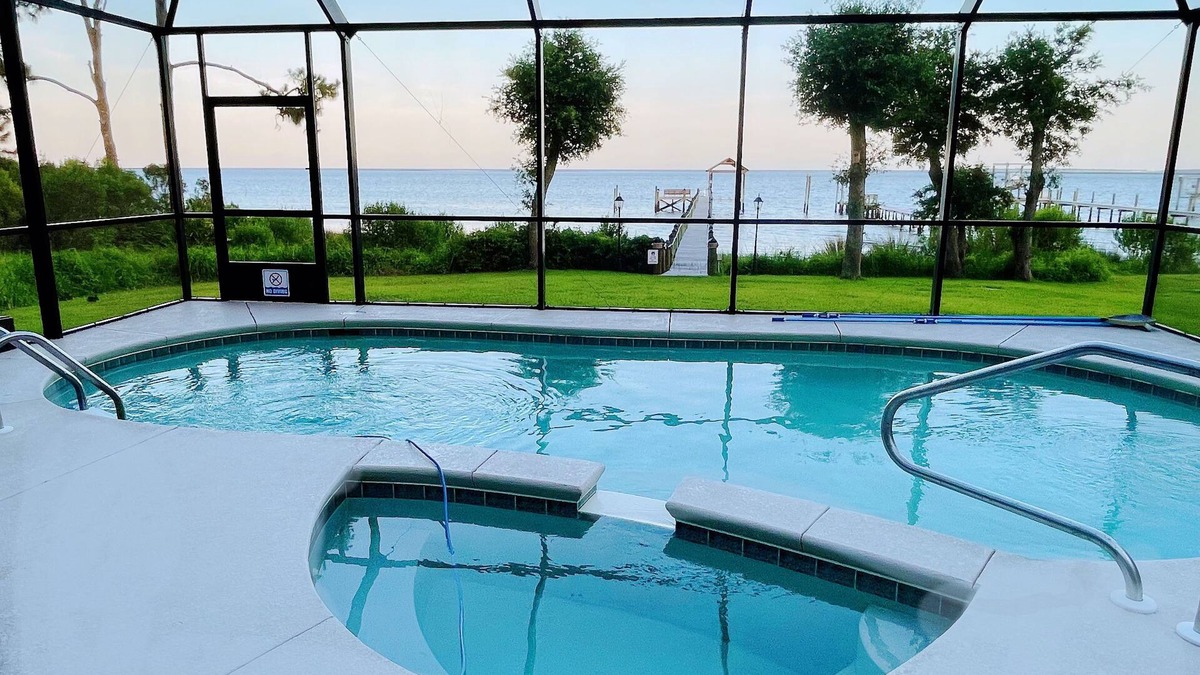 Carrabelle House | Lily’s Escaped, Private screen cover pool, fishing dock,