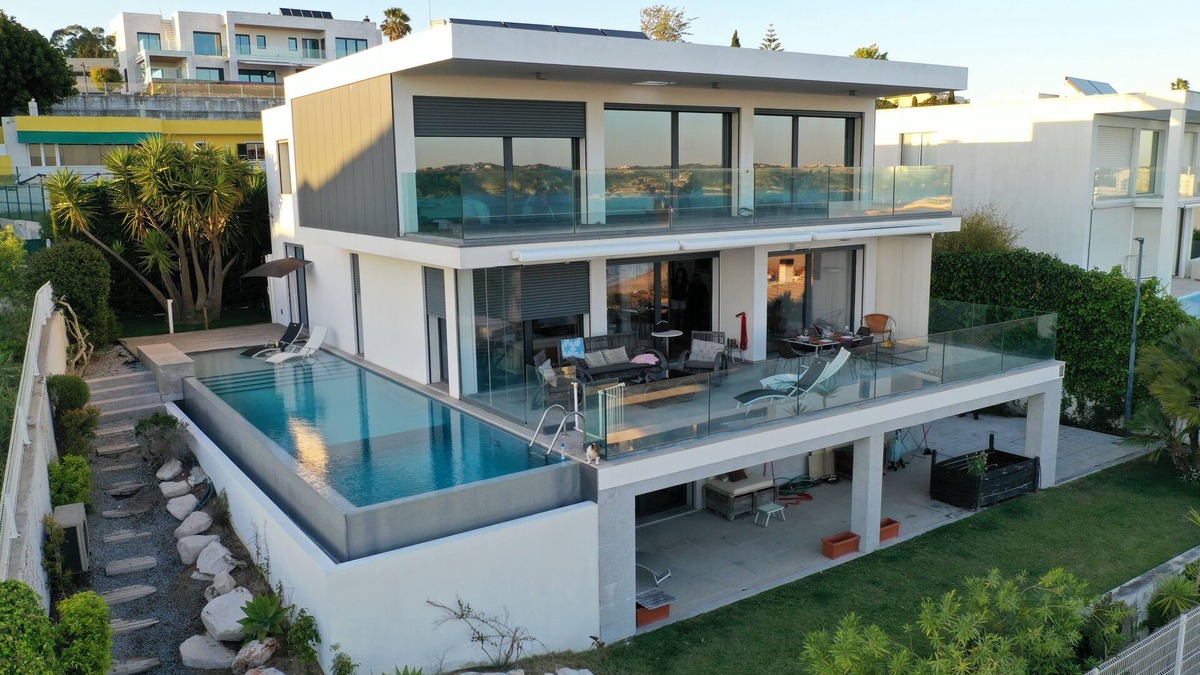 Linda-a-Velha Villa | Lisbon 3 floor 3 bedroom Villa, unique Sea View, Infinity Pool, Terrace, and Gym