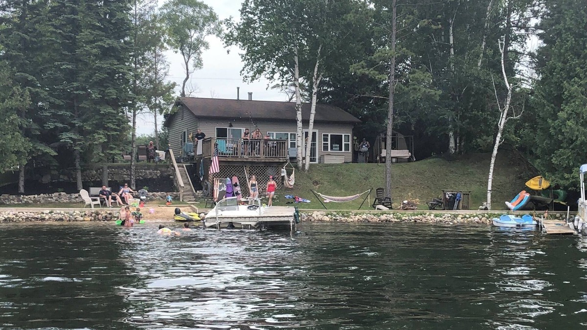 Long Lake Cottage | Little Long Lake lakefront cottage with its own beach and private drive.