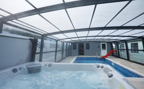 Lisvane Apartment | Llwyn Pia by N And N Stays Ltd, with Private Pool, Sauna and hot tub, perfect for relocation, workers or Your Ideal Getaway