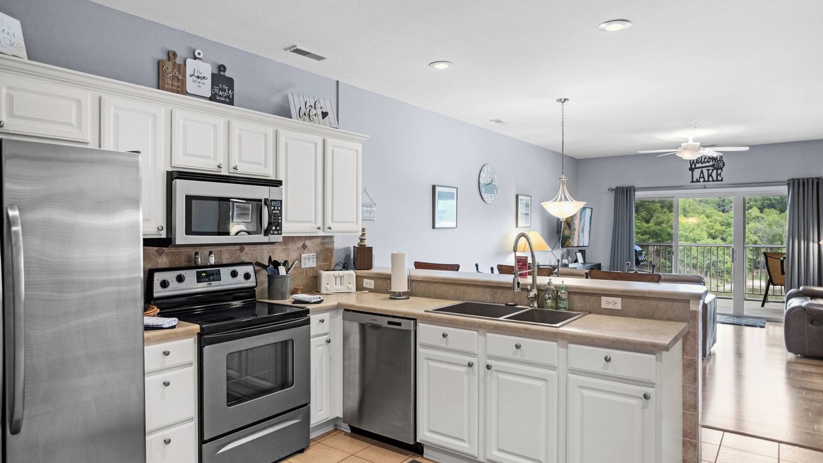 Camdenton Condo | Loch Haven 138-6E - Serene Views from the Screened Deck!