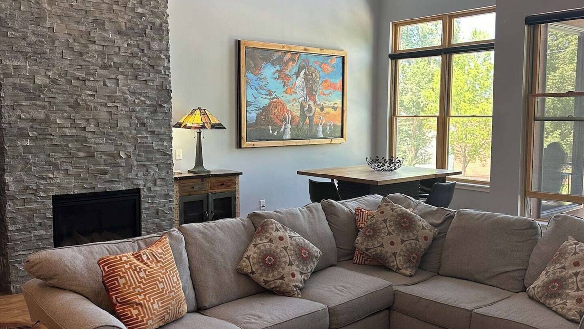 Salida Condo | Lofted condo on the boat ramp, downtown Salida, king bed plus super comfortable queen murphy bed and sleeper sofa. Two levels, two bathrooms, parking spot in garage included.