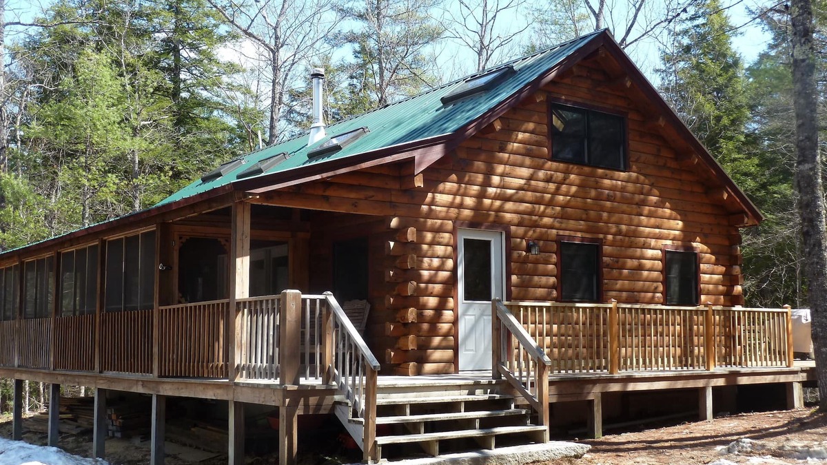 Fryeburg Cabin | Log Cabin on Spacious Lakeside Woodlands, with Private Beach and Waterfront.