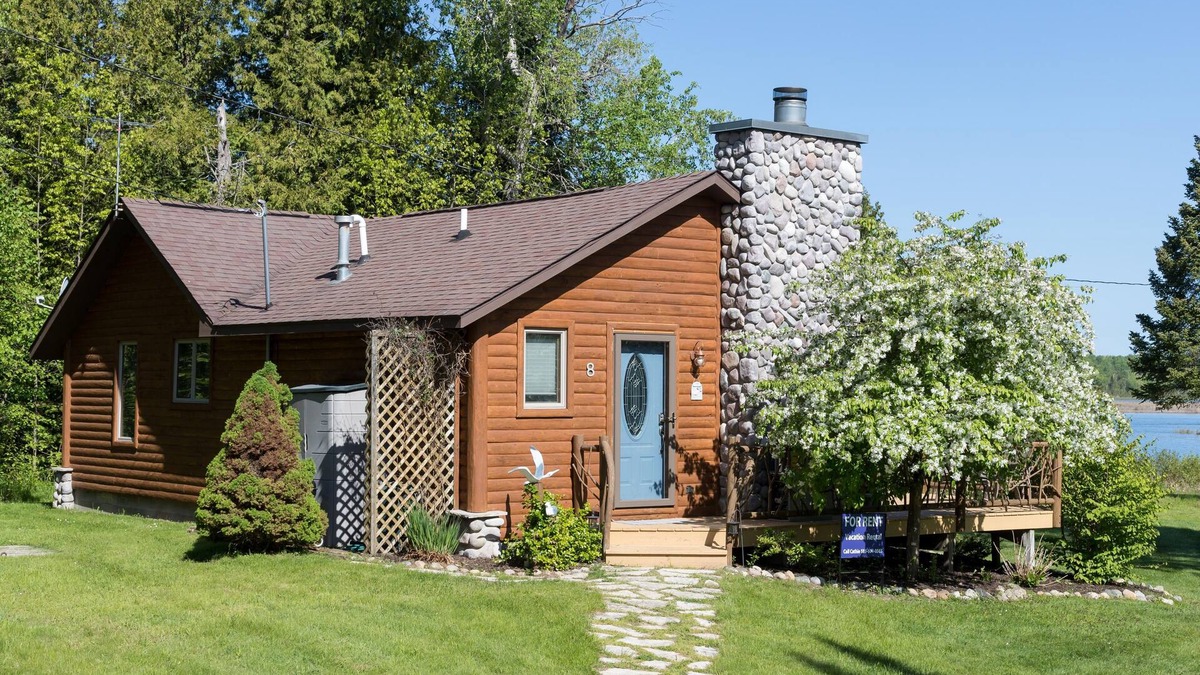 Indian River Cabin | Log Cabin on the Canal of the Indian River between Burt Lake and Mullet Lake!
