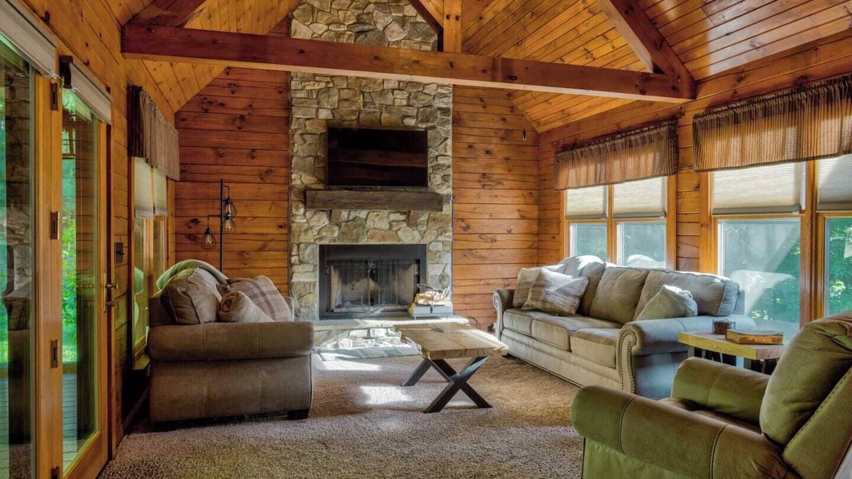 Cedarhurst Cabin | Log Cabin with living room fireplace and hot tub