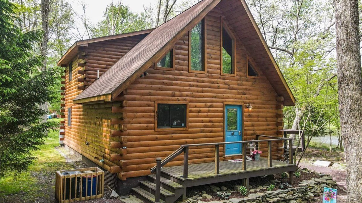 East Stroudsburg House | Log Home on Water- a True Pocono Mountains Gem!