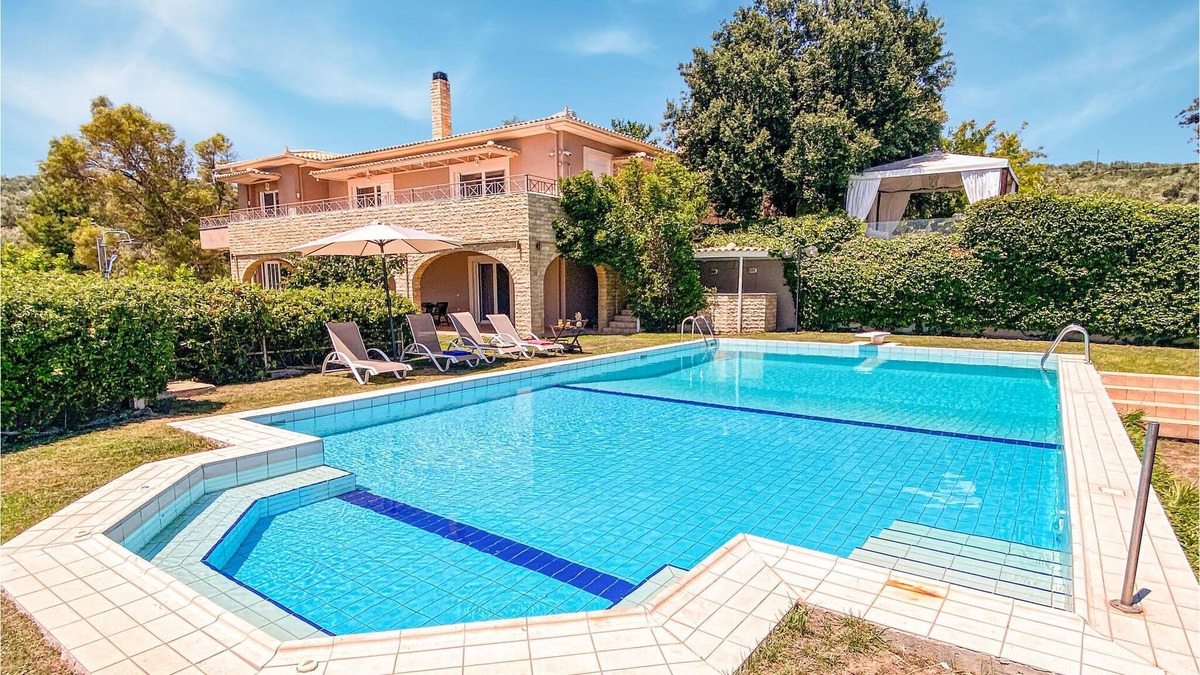 Lokroi House | Look forward to a breathtaking view from the sunny terrace of this vacation home with pool!