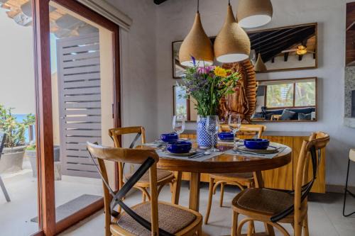 South Hotel Zone Hotel | Los Tules 501 one bedroom apartment with ocean views and lush palm gardens