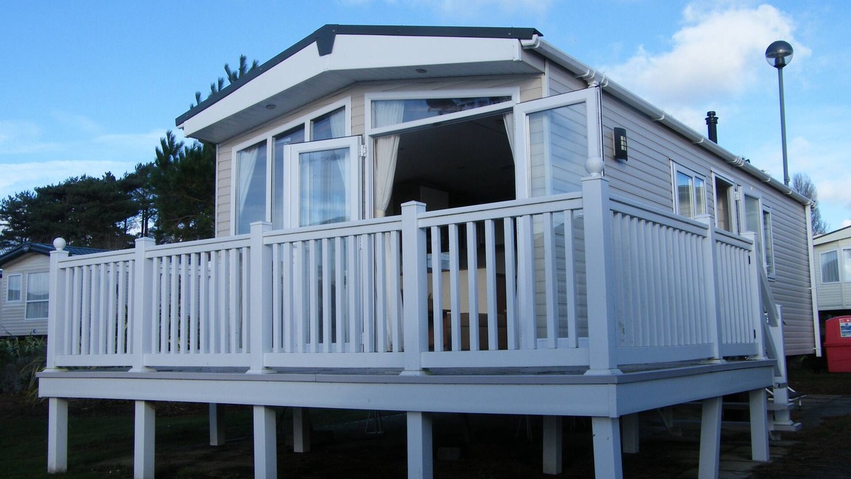 Hamworthy House | Lotus 2 bedroom dog friendly caravan with veranda offers a stunning sea view.