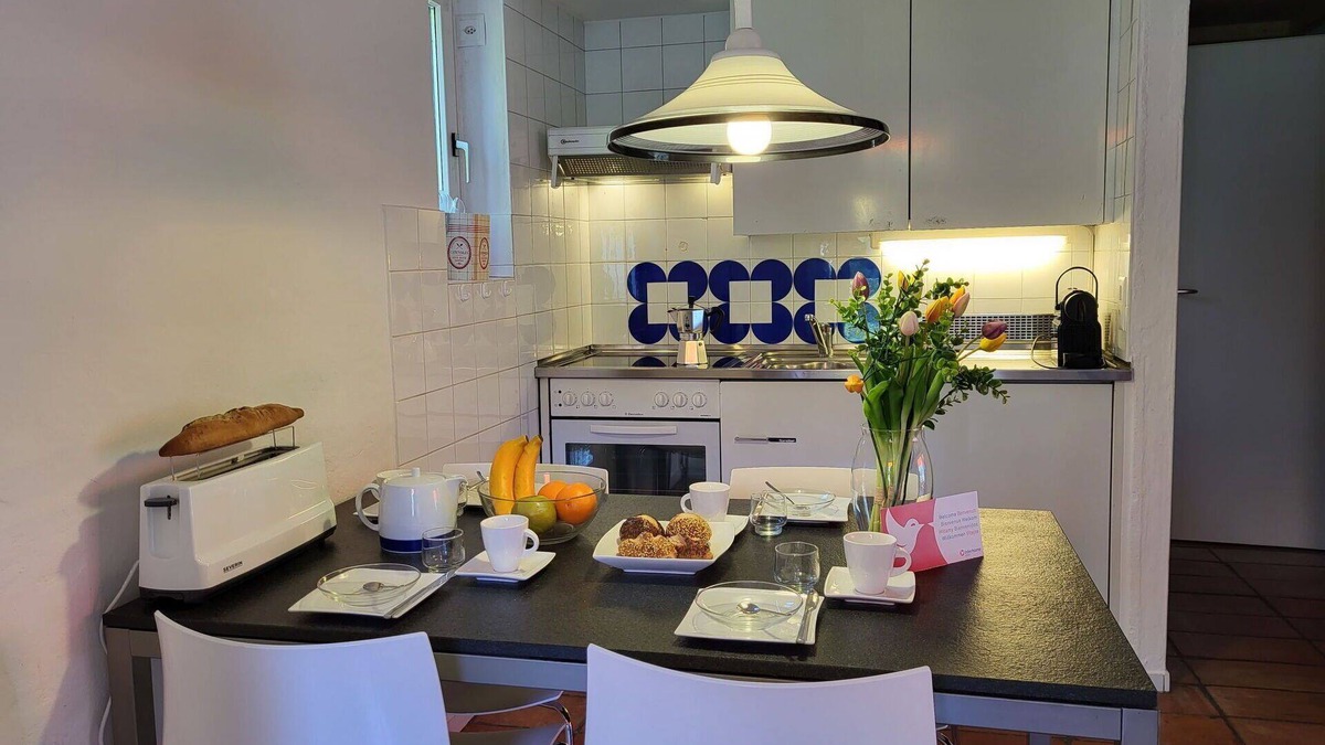 Capriasca Apartment | Lovely apartment for 5 guests with WIFI, pool, TV, patio, pets allowed and parking