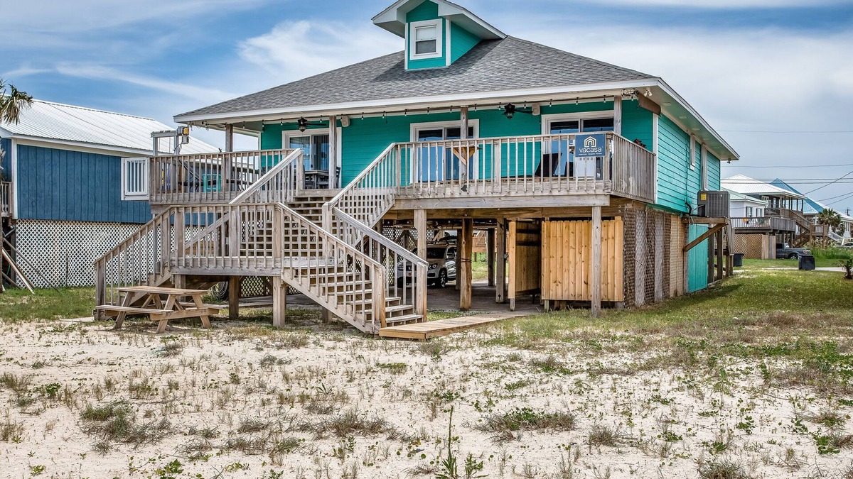 Silver Cay House | Lovely beachfront home with a private dock & spacious deck - dogs welcome
