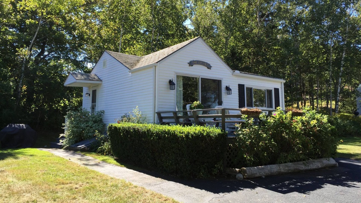 Bailey Island Cottage | Lovely deck to watch the boats come and go, and incredible sunsets!