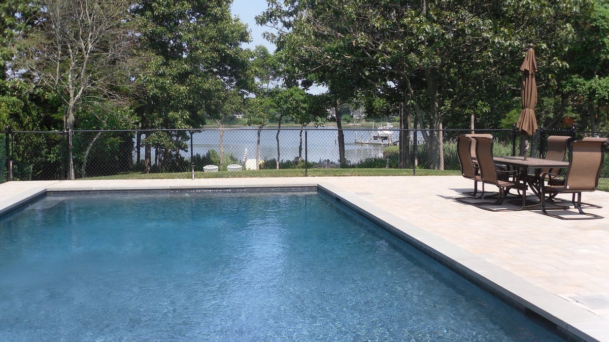 Menantic Creek House | Lovely home by the sea with dock and heated Gunite pool!