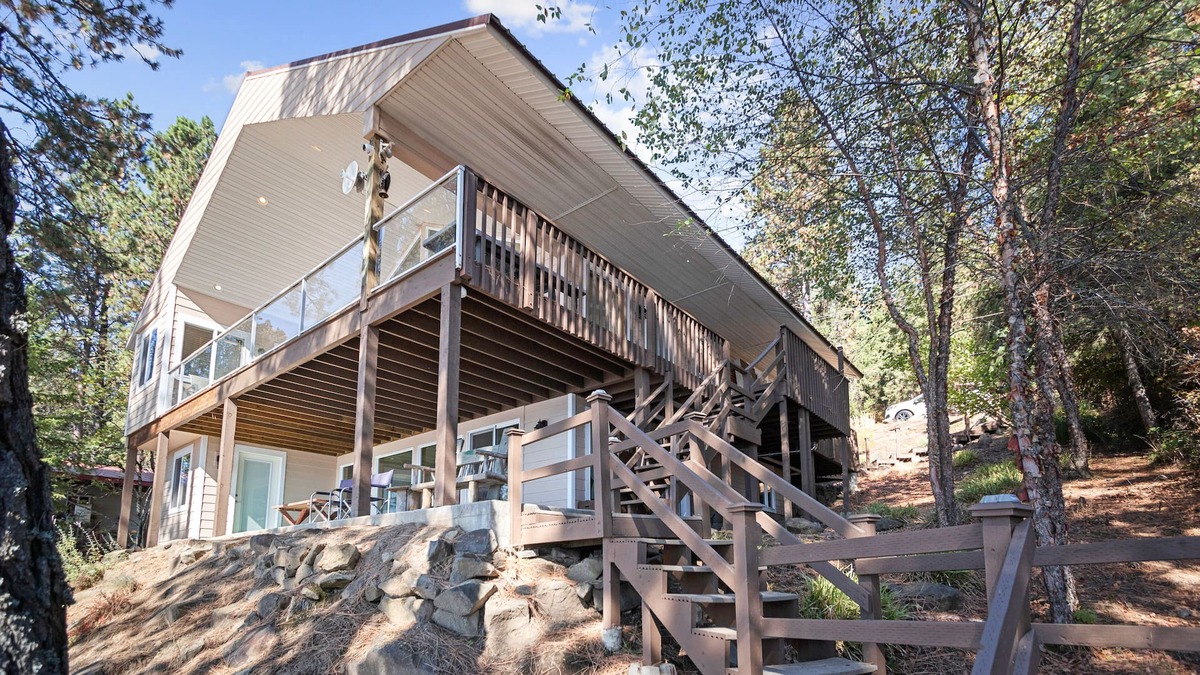 Worley House | Lovely Oasis in the Trees w/Wraparound Deck, Lake View, Pool Table, & Game Room