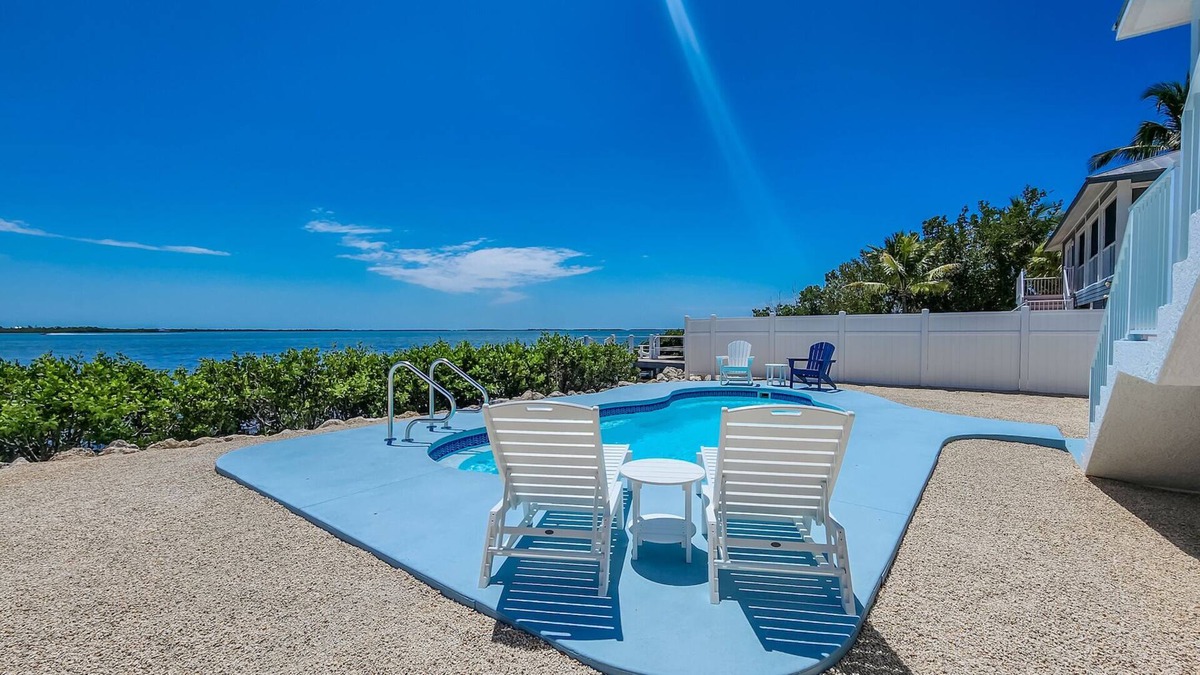 Breezeswept Beach Estates House | Low Key Sunrise: Waterfront pool home