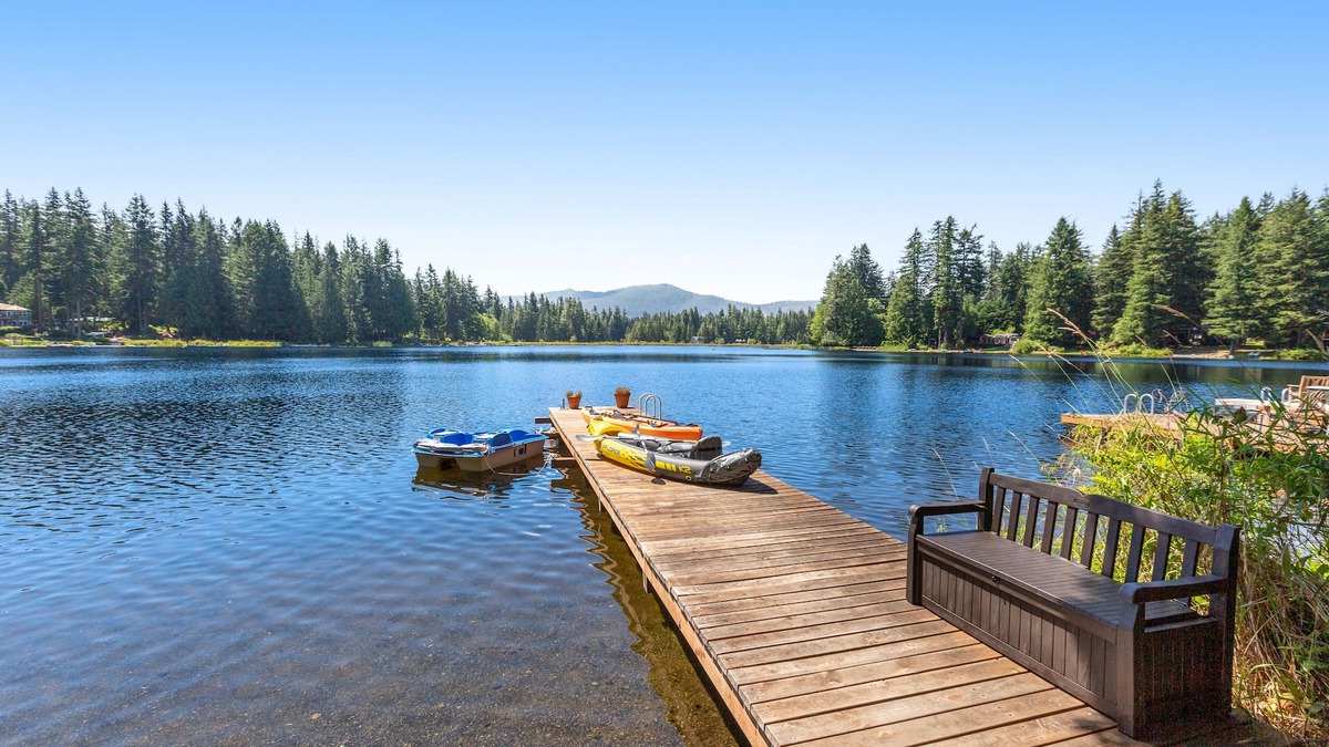 Fall City Cabin | Luxe lakeside cottage with furnished porch, 2 docks, fire pit, deck, beachfront