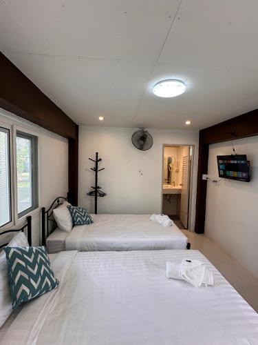 K. Phu Pieng Bed & Breakfast | Luxe Nan Twin Bed Room