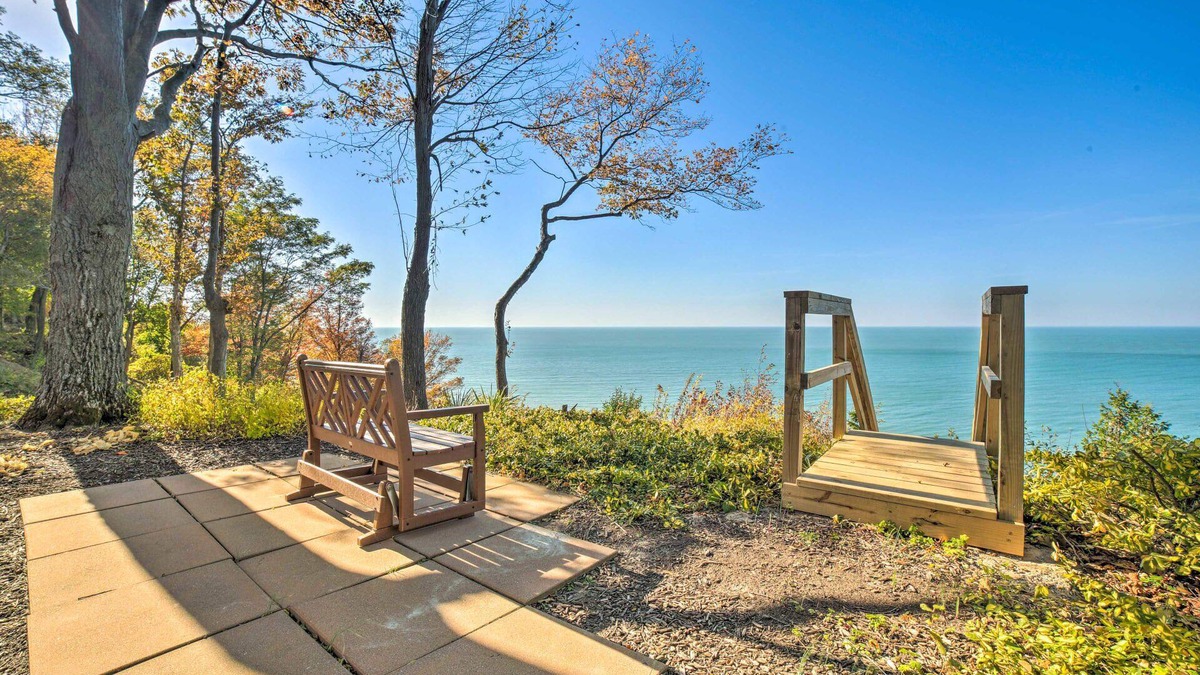 Riverside House | Luxe Waterfront Haven: Private Beach, Hot Tub