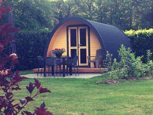 Bavinkel Ski Chalet | Luxe woodlodge in bosrijke omgeving incl eigen douche en keuken