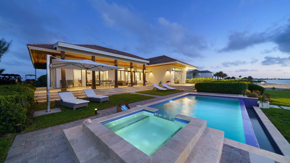 Alice Town House | Luxurious Beachfront Home with pool—short golf cart ride away from Hilton casino