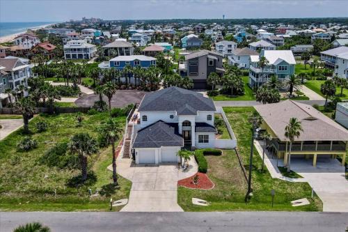Marineland Acres House | Luxurious Beachfront Home with Hot Tub Fenced Yard Bikes Fire Pit