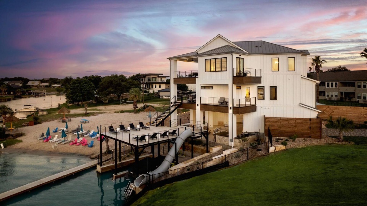 Granite Shoals House | Luxurious Lake Retreat: Sleeps 18, King Suites, Pool, Slide, Sun Deck, Elevator