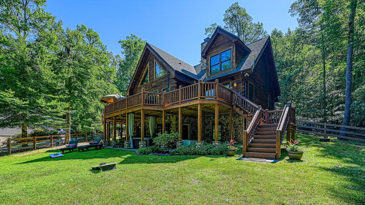 Bumpass Cabin | Luxurious lakefront cabin with hot tub, game room, & washer/dryer- dog friendly