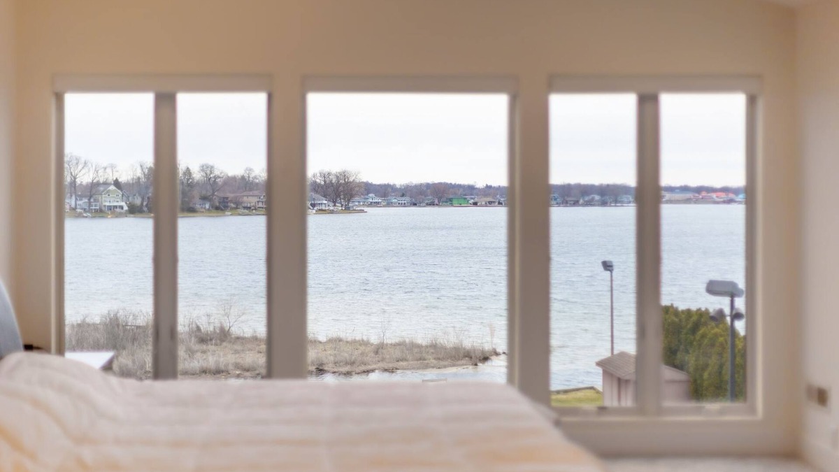 La Porte House | Luxurious Lakefront Estate with Pool, King Beds, Hot Tub MTM Premier Property Management