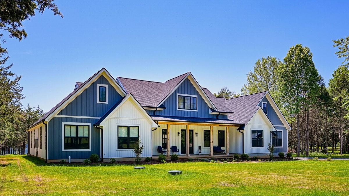 Louisa House | Luxurious lakeside home with private dock, beach, patio, & game room - dogs OK