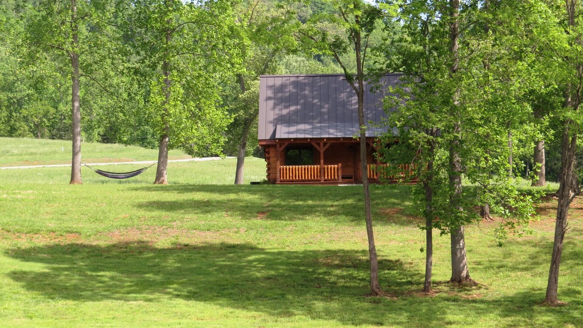 Faber Cabin | Luxurious Log Cabin On 200 Acres Overlooking Private Lake.