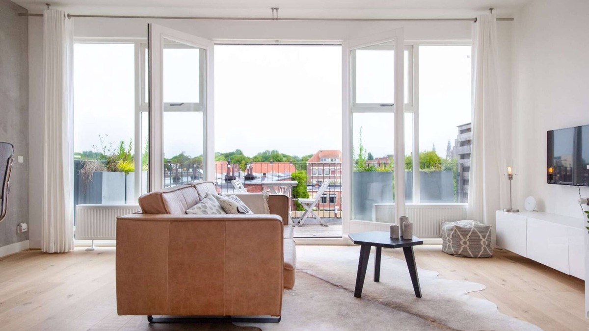 Groningen Apartment | Luxurious rooftop penthouse with rooftop terrace, a balcony, bath, duo shower