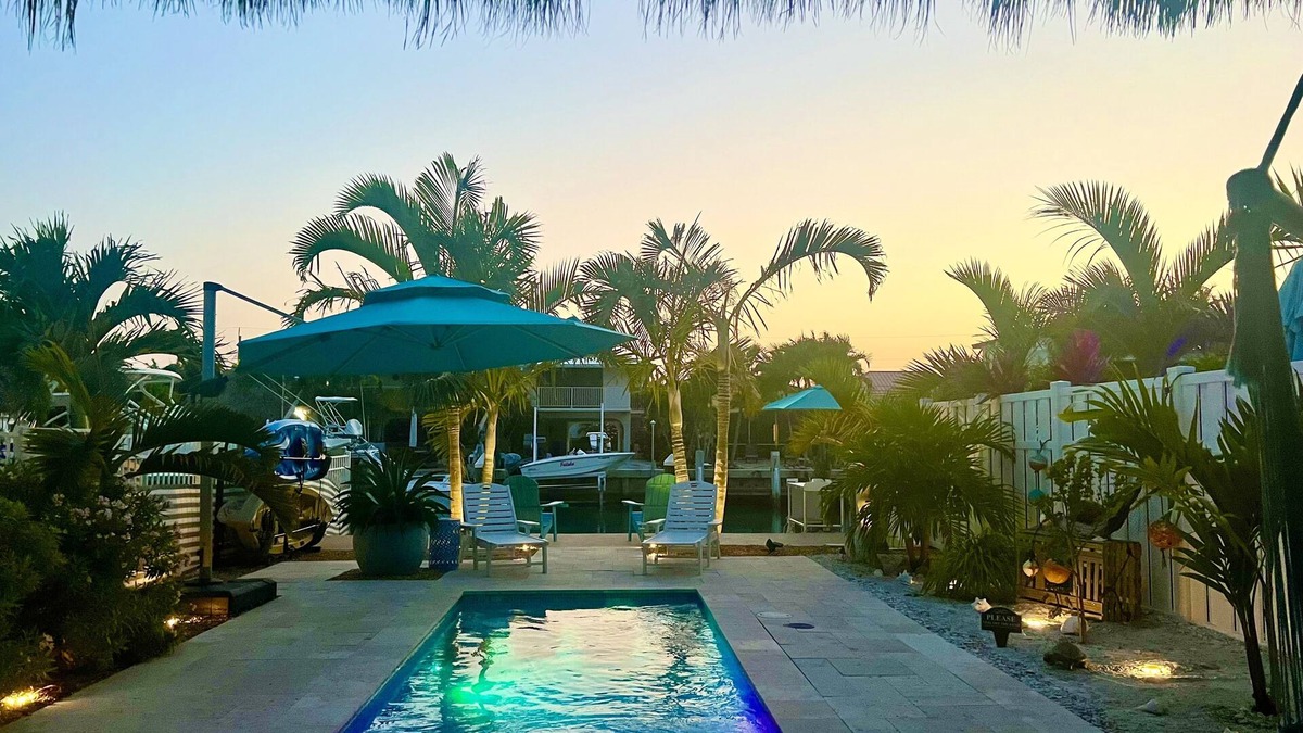 Key Colony Beach House | Luxurious Waterfront Oasis: 2BR, Private Heated Pool, Tiki, Dock