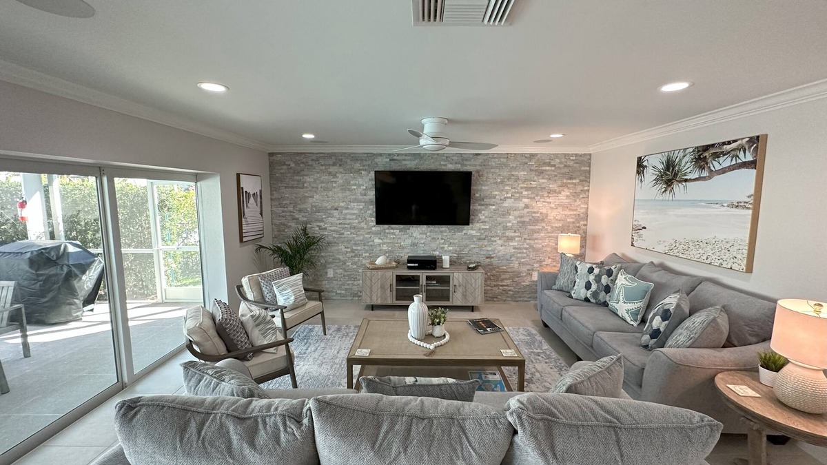 Isles of Capri House | Luxurious Waterfront Retreat! Oversized Heated Pool and expansive outdoor area!