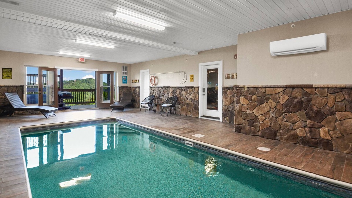 Gatlinburg - Pigeon Forge Cabin | Luxury 12BR/14BA Cabin w/Indoor Pool, Hot Tub, Arcade, & Theater! Perfect for Family Reunions!