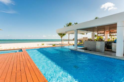 Playa Mujeres Apartment | Luxury 2-Bedroom Apartment with Beach Club Access