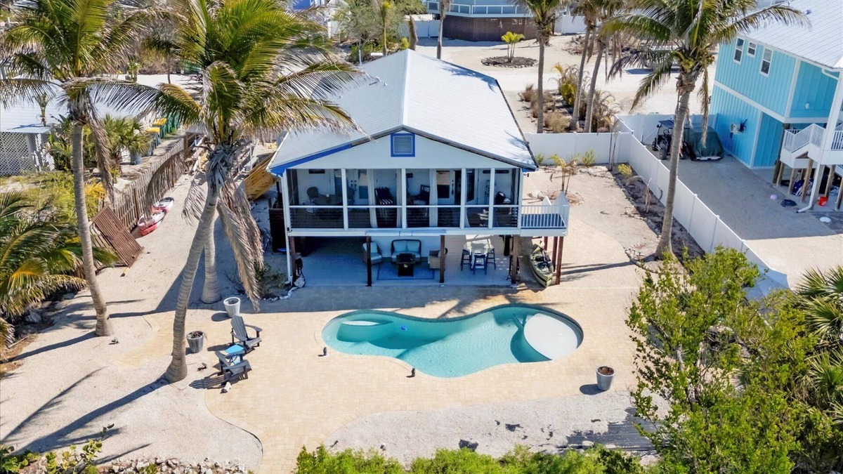 Palm Island House | Luxury 3 bedroom pool home on Bocilla Lagoon!