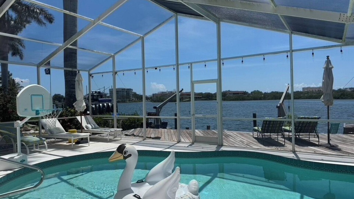 Sarasota House | Luxury 3-bedroom pool home on the scenic Intercoastal, 1 mile from beach access.