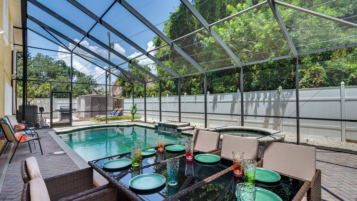 Dunedin House | Luxury 5 Bedroom Dunedin home ~ TWO full kitchens, heated pool, hot tub!