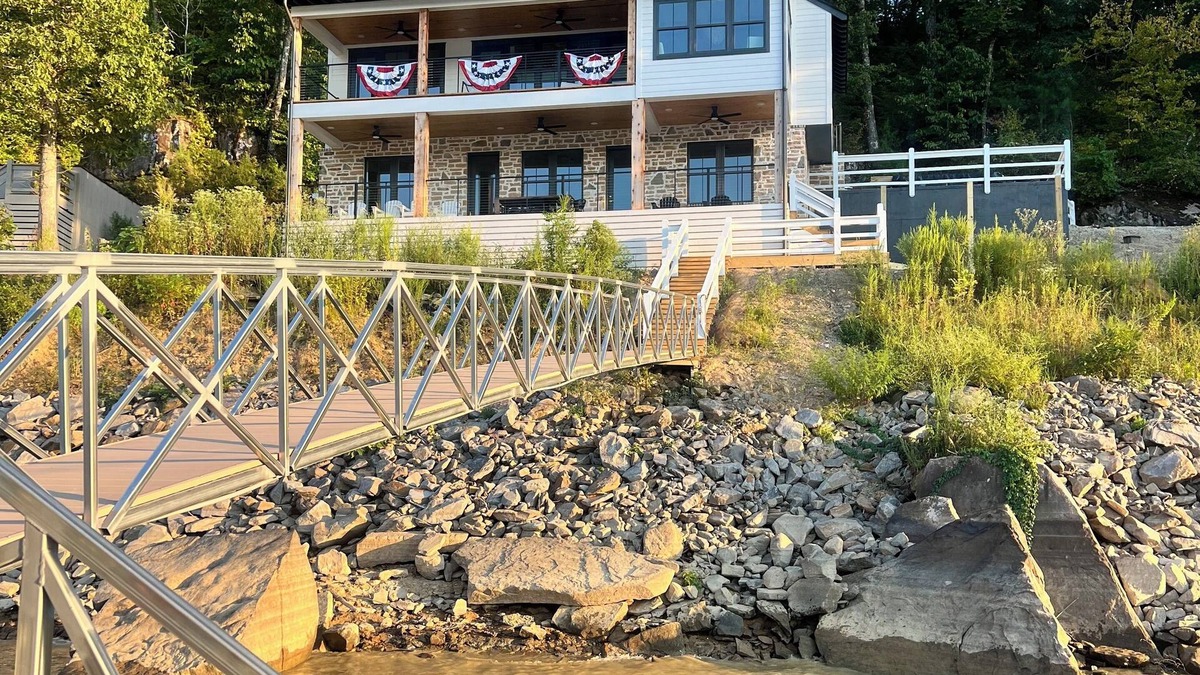 Crane Hill House | Luxury 5BR Lakefront w/Dock, Hot Tub & Pool In Point William